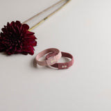 Light pink and dark pink plastic free hair ties by KOOSHOO. Multi-use and biodegradable that are perfect for any hair type or occasion #color_wild-plum