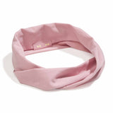 KOOSHOO organic twist headband in matte mauve that features a sustainable multi-use design. Consciously created and 100% certified organic #color_golden-shades