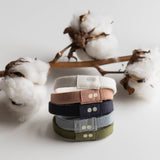 KOOSHOO plastic-free pantone spring/ summer collection hair ties classics. Captured in front of organic cotton bud #color_classics