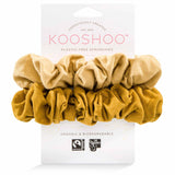 Mustard cream scrunchies on packaging that are plastic-free and consciously created #color_gold-sand