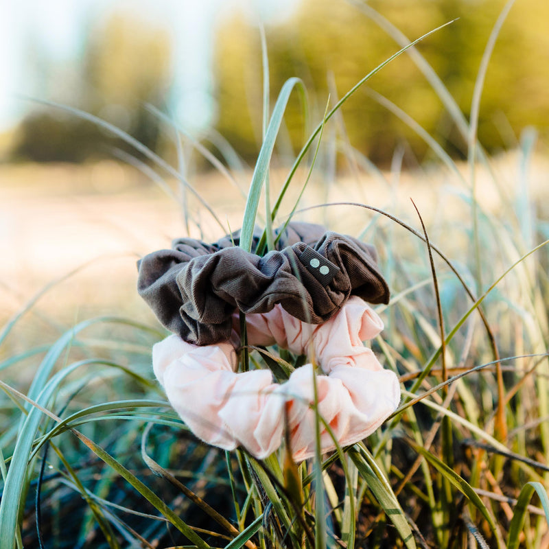 KOOSHOO plastic-free scrunchies stacked on seagrass #color_blush-walnut