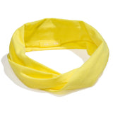 KOOSHOO organic twist headband in luminous yellow. Bright and fun summer headband off-packaging #color_luminous-yellow